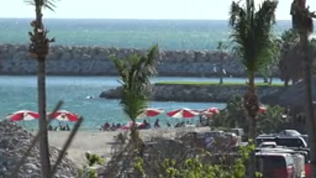GRAND JUNCTION COLORADO-2017: Beautiful Beach Landscape With People On The Sand