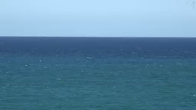 GRAND JUNCTION COLORADO-2017: A Tranquil Evening Sea Scene with Gentle Waves