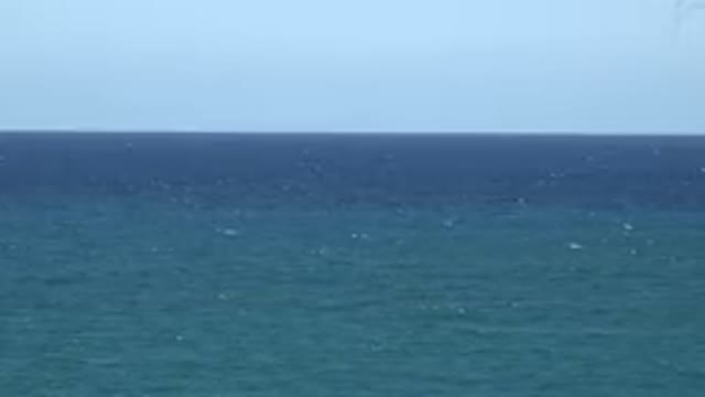 GRAND JUNCTION COLORADO-2017: Ocean And Sky On A Sunny Day Calm Sea