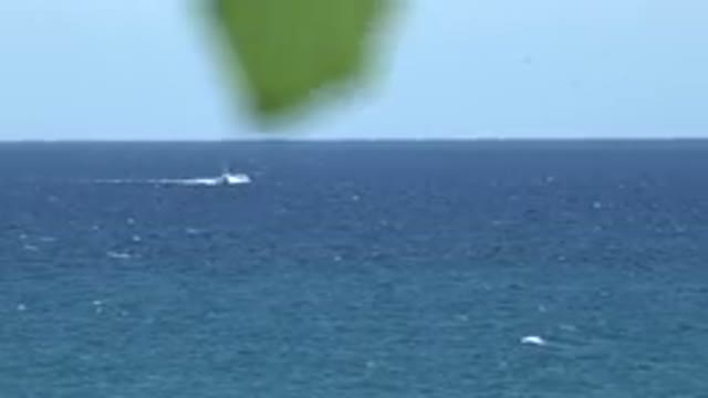 GRAND JUNCTION COLORADO-2017: Boat Sails On Open Blue Sea With A Couple