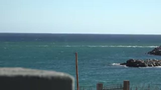 GRAND JUNCTION COLORADO-2017: A Beautiful And Clear Blue Sea With Waves Crashing