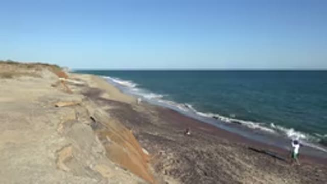 GRAND JUNCTION COLORADO-2017: People Walking On The Beach On A Beautiful And