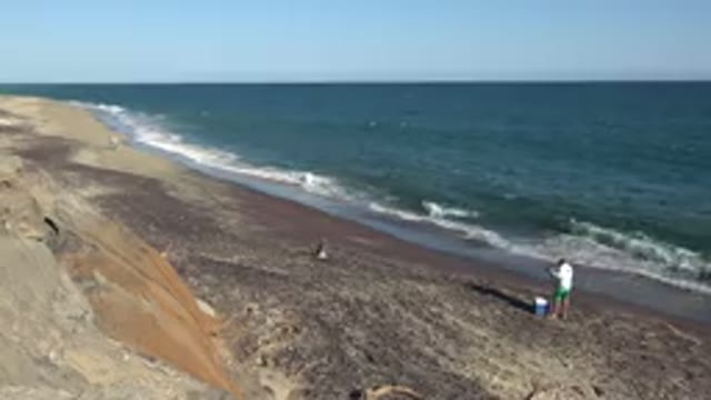 GRAND JUNCTION COLORADO-2017: A Man Fishing Along The Coast Line