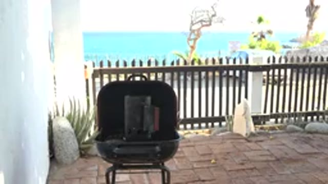 GRAND JUNCTION COLORADO-2017: Preparing Barbecue Steaks On A Hot Summer Day In A