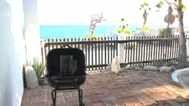 GRAND JUNCTION COLORADO-2017: A Patio With A Grill On The Beach Looking Over The Ocean