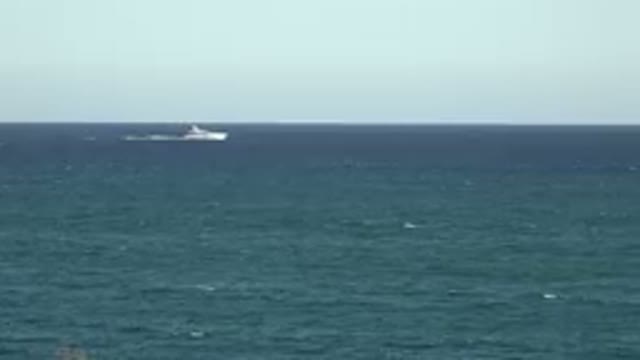 GRAND JUNCTION COLORADO-2017: Ocean With Sky And A Boat Crossing The Frame