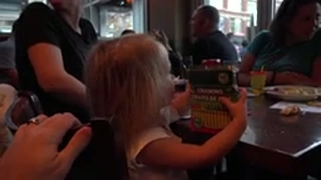 DENVER COLORADO-2016: Kid Eating at Family Shopping Trip in Mall