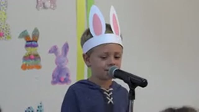 CABO SAN LUCAS MEXICO-2019: A Small Kid Wearing Bunny Ears Talking To A
