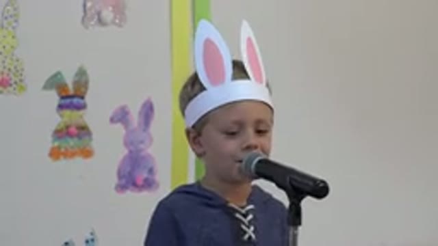 CABO SAN LUCAS MEXICO-2019: Boy Wearing Blue Shirt and White Rabbit Ears Talks