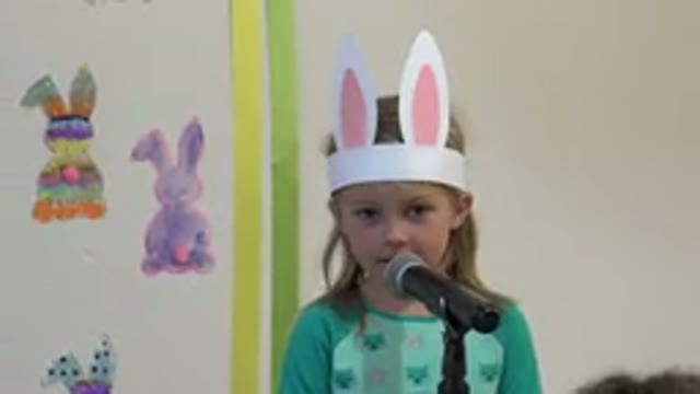 CABO SAN LUCAS MEXICO-2019: Cute Girl Wearing Bunny Ears Sings in Easter Play