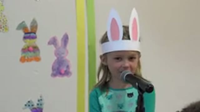 CABO SAN LUCAS MEXICO-2019: Little Girl Wearing A Green Shirt With A Bunny Paper Prop
