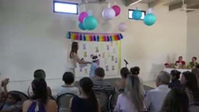 CABO SAN LUCAS MEXICO-2019: Boy Wearing Blue Shirt and White Rabbit Ears Talks