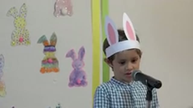 CABO SAN LUCAS MEXICO-2019: Young Boy With Hand Crafted Rabbit Ears Speaks His