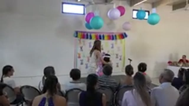 CABO SAN LUCAS MEXICO-2019: Easter Commemoration Kid Peeking in School Presentation