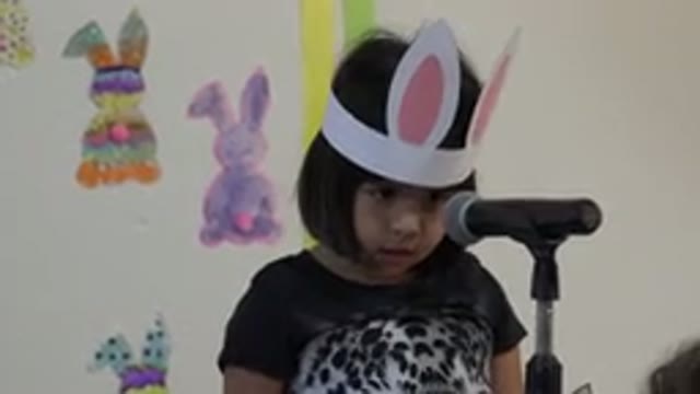CABO SAN LUCAS MEXICO-2019: Little Girl On Stage Giving A Speech Into A Microphone