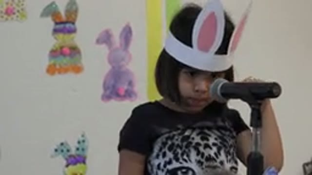 CABO SAN LUCAS MEXICO-2019: Cute Child With Bunny Ears Gives School Speech