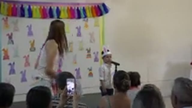 CABO SAN LUCAS MEXICO-2019: Boy With Rabbit Ear Singing At School Presentation