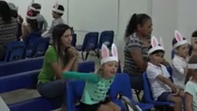 CABO SAN LUCAS MEXICO-2019: Young Girl With Bunny Ears Talks Impatiently In Room