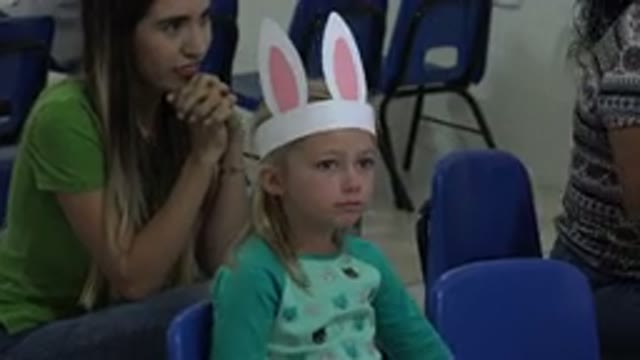 CABO SAN LUCAS MEXICO-2019: Child Wearing Bunny Ears Sitting On Chair
