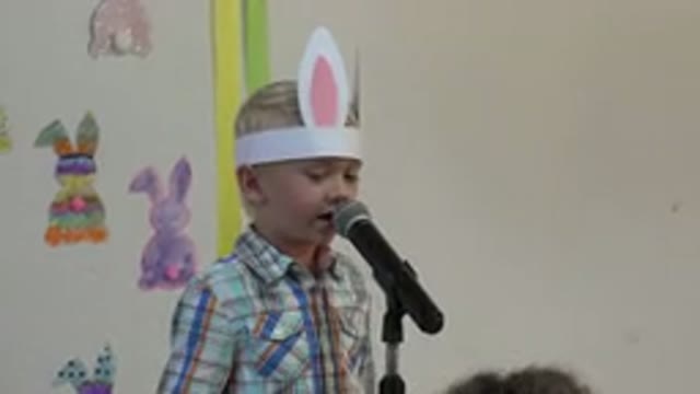 CABO SAN LUCAS MEXICO-2019: Boy Wearing Blue Shirt and White Rabbit Ears Talks