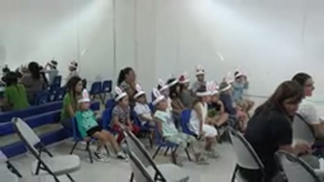 CABO SAN LUCAS MEXICO-2019: Children Wearing Paper Bunny Ears Sitting in A