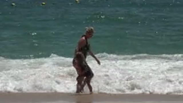 CABO SAN LUCAS MEXICO-2019: A Beautiful Sunny Day On The Beach With Your Child Playing