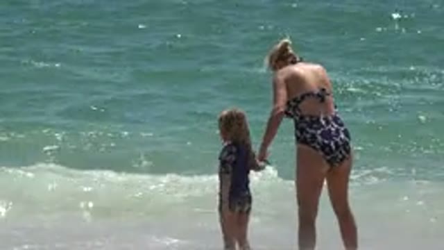CABO SAN LUCAS MEXICO-2019: Mom And Daughter At The Sea