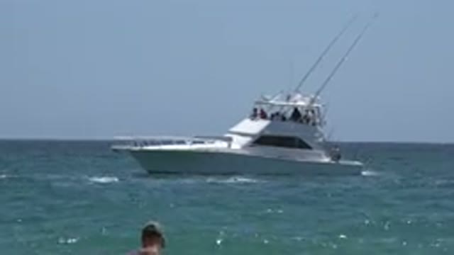 CABO SAN LUCAS MEXICO-2019: A Ship Stands Still at Beach in Middle of Ocean