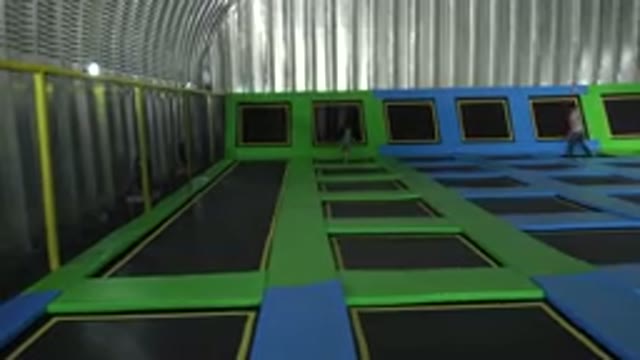 CABO SAN LUCAS MEXICO-2019: Little Girl Running in a Room Covered in Trampolines