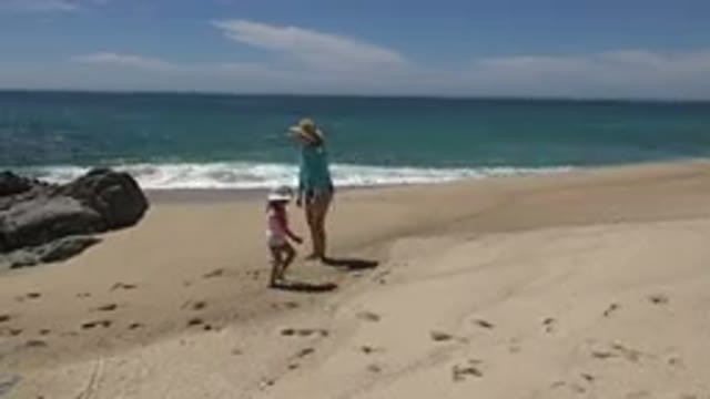 CABO SAN LUCAS MEXICO-2019: Beach In A Sunny Day With Rocks Sand Sea Blue Sky