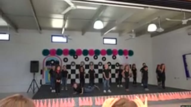CABO SAN LUCAS MEXICO-2019: Boy Wearing Black Shirt With Blue Jeans Stands Up To