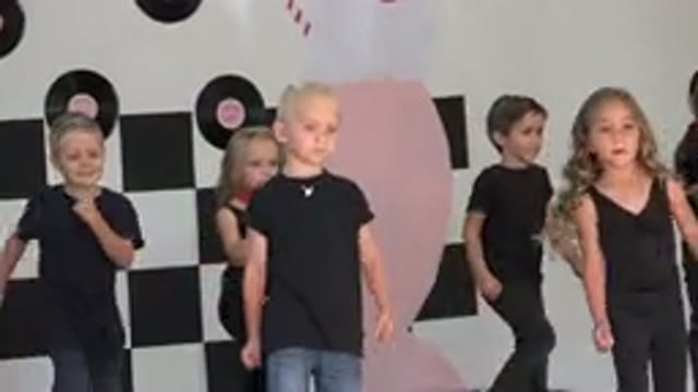 CABO SAN LUCAS MEXICO-2019: Little Children in Black and Red Attire Dancing Folk