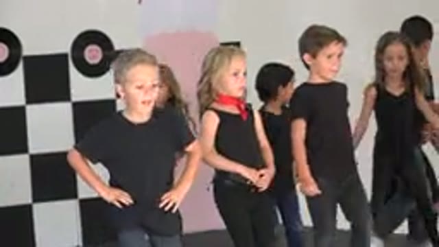 CABO SAN LUCAS MEXICO-2019: Lille Kids Dancing in Black Attire to Folk Music
