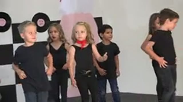 CABO SAN LUCAS MEXICO-2019: Girl Wearing Black Shirt With Red Scarf Dances With
