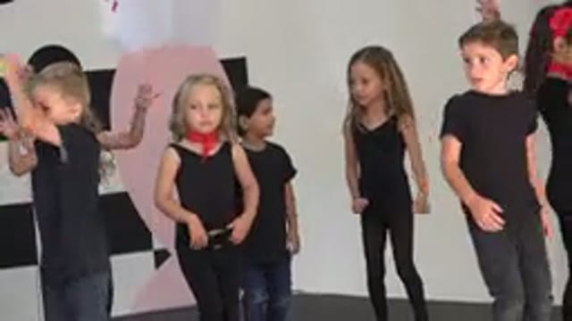 CABO SAN LUCAS MEXICO-2019: Little Boys And Girls In Black Dress Are Dancing On
