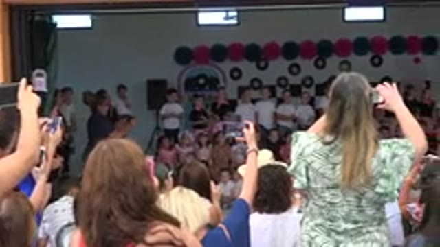 CABO SAN LUCAS MEXICO-2019: Mothers Taking Pictures While Their Children Perform
