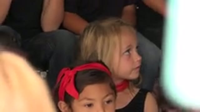 CABO SAN LUCAS MEXICO-2019: Little Girl Sitting in a Crowd of Children Waiting