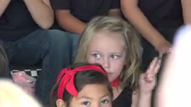 CABO SAN LUCAS MEXICO-2019: Several Children Focusing On A Blonde Child Wiggling