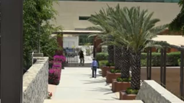 CABO SAN LUCAS MEXICO-2019: Man In Blue Shirt Walking Down Street
