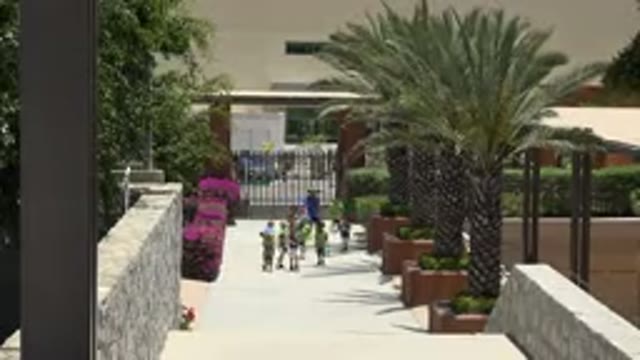 CABO SAN LUCAS MEXICO-2019: Kids And Coach Leaving Soccer Field And Going Into A