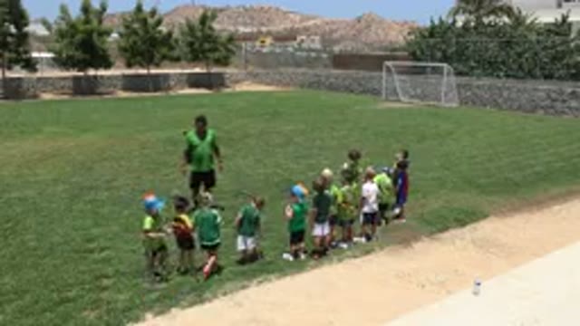 CABO SAN LUCAS MEXICO-2019: Coach Prepares Little Kids to Play Soccer