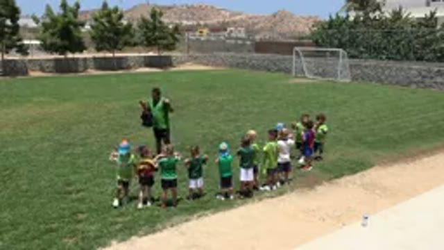 CABO SAN LUCAS MEXICO-2019: Amazing Little Kids Playing Soccer On Grass