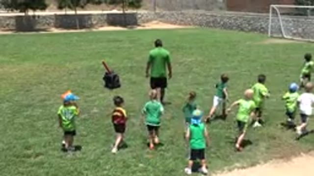 CABO SAN LUCAS MEXICO-2019: Kids Running Across the Soccer Field