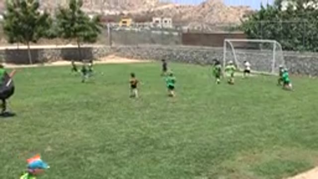CABO SAN LUCAS MEXICO-2019: Football Goal In A Grass Field With Little Boys