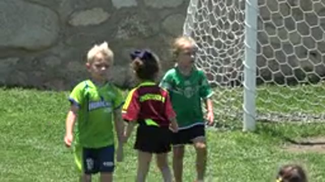 CABO SAN LUCAS MEXICO-2019: Kids On A Soccer Field Playing Soccer Goal Net