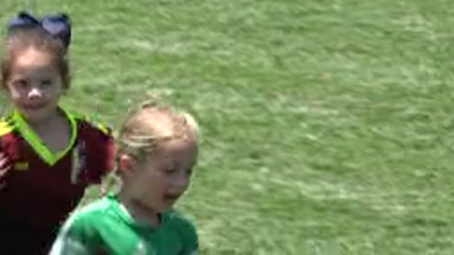 CABO SAN LUCAS MEXICO-2019: Two Small Girls In Red And Green T-Shirt Are Running