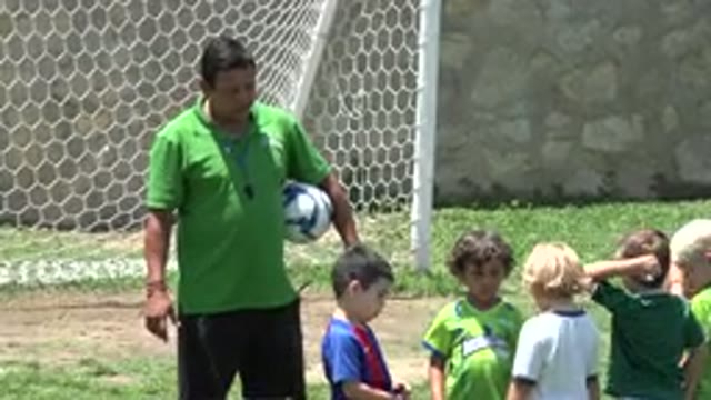 CABO SAN LUCAS MEXICO-2019: Kids Having Fun Playing Soccer Outside