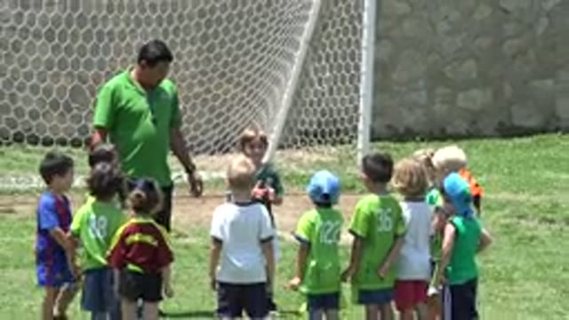 CABO SAN LUCAS MEXICO-2019: Coach Teaching Kids How to Play Soccer
