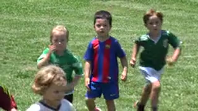 CABO SAN LUCAS MEXICO-2019: Kids Running Energetically During A Sunny Day On A Manicured Field