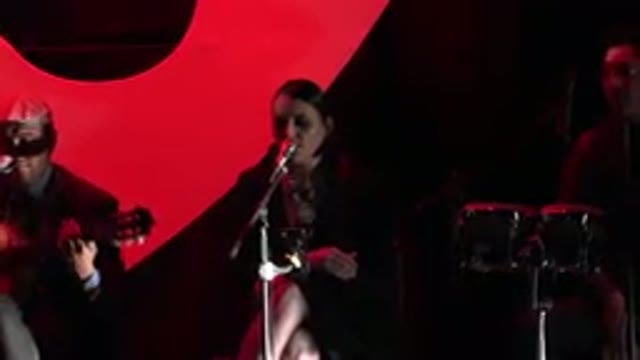 CABO SAN LUCAS MEXICO-2019: A Band On A Stage With A Woman Singer